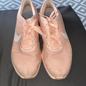 Orange Nike tennis shoes youth 6.5 but women’s 8